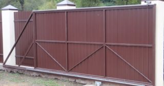 Купить откатные ворота из профнастила Черняховск, цена от 1798 руб.