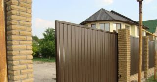 Купить откатные ворота из профнастила Черняховск, цена от 1798 руб.